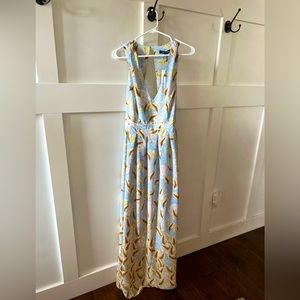 Beautiful light blue and tan Maxi dress. Runs a little big. NWT